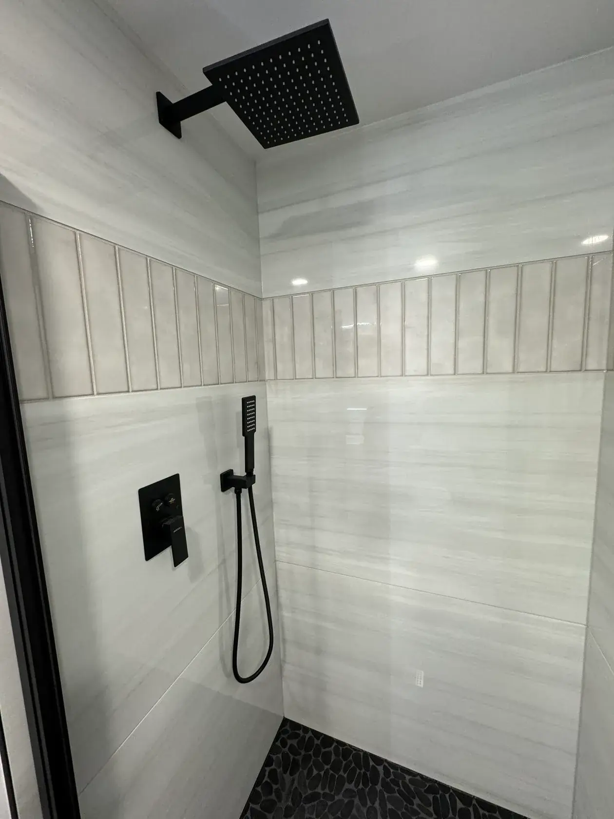 Bathroom remodeling in Naperville IL with tile, vanity, drywall and paint by BeaverBuild