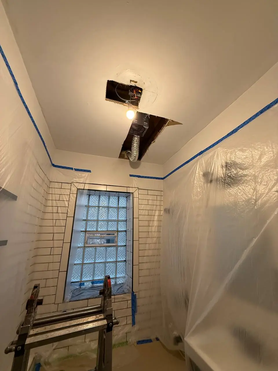 Water damage drywall repair in Chicago IL with patching, paint and trim by BeaverBuild